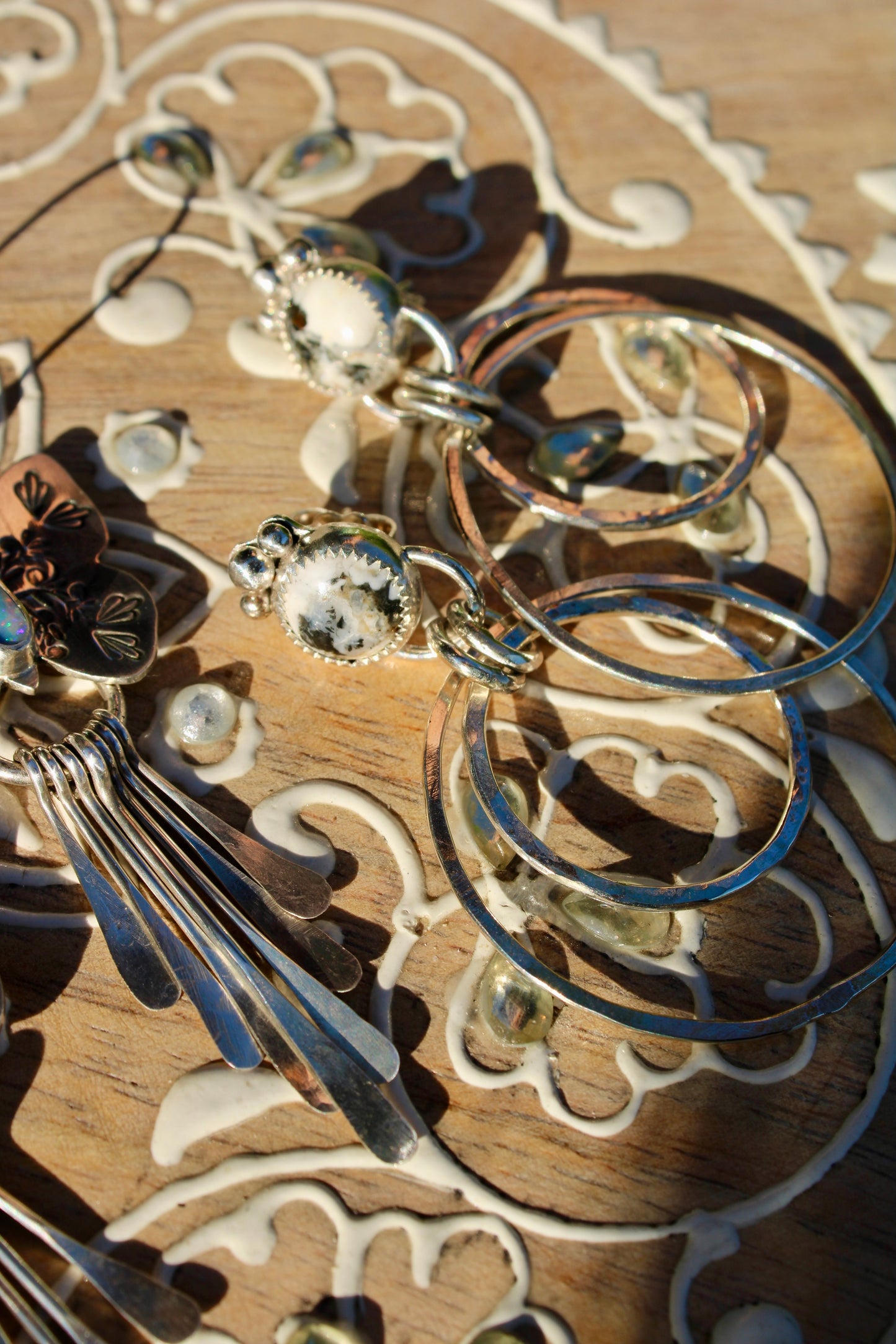 WHITE BUFFALO HOOP EARRINGS